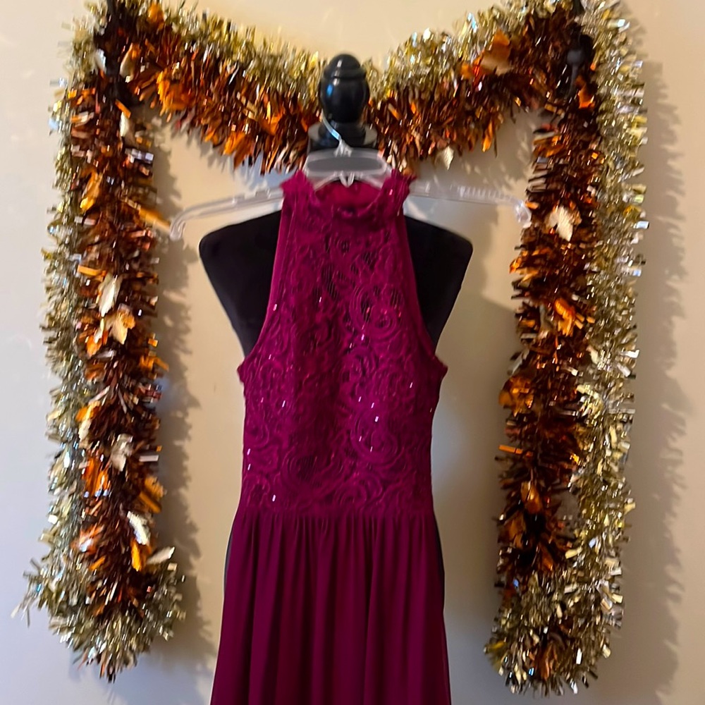 Juniors burgundy high neck gown with sequence.